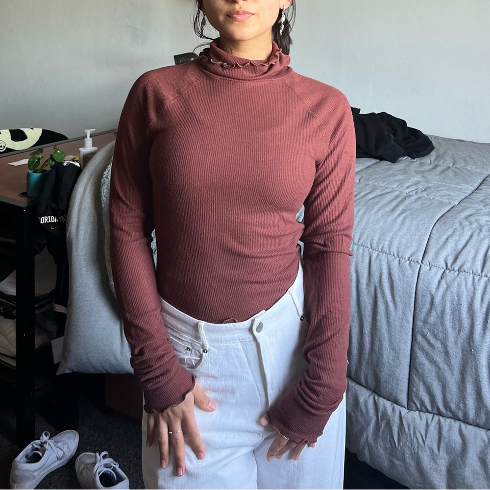 Long sleeve turtleneck from Urban Outfitters. Never been worn.